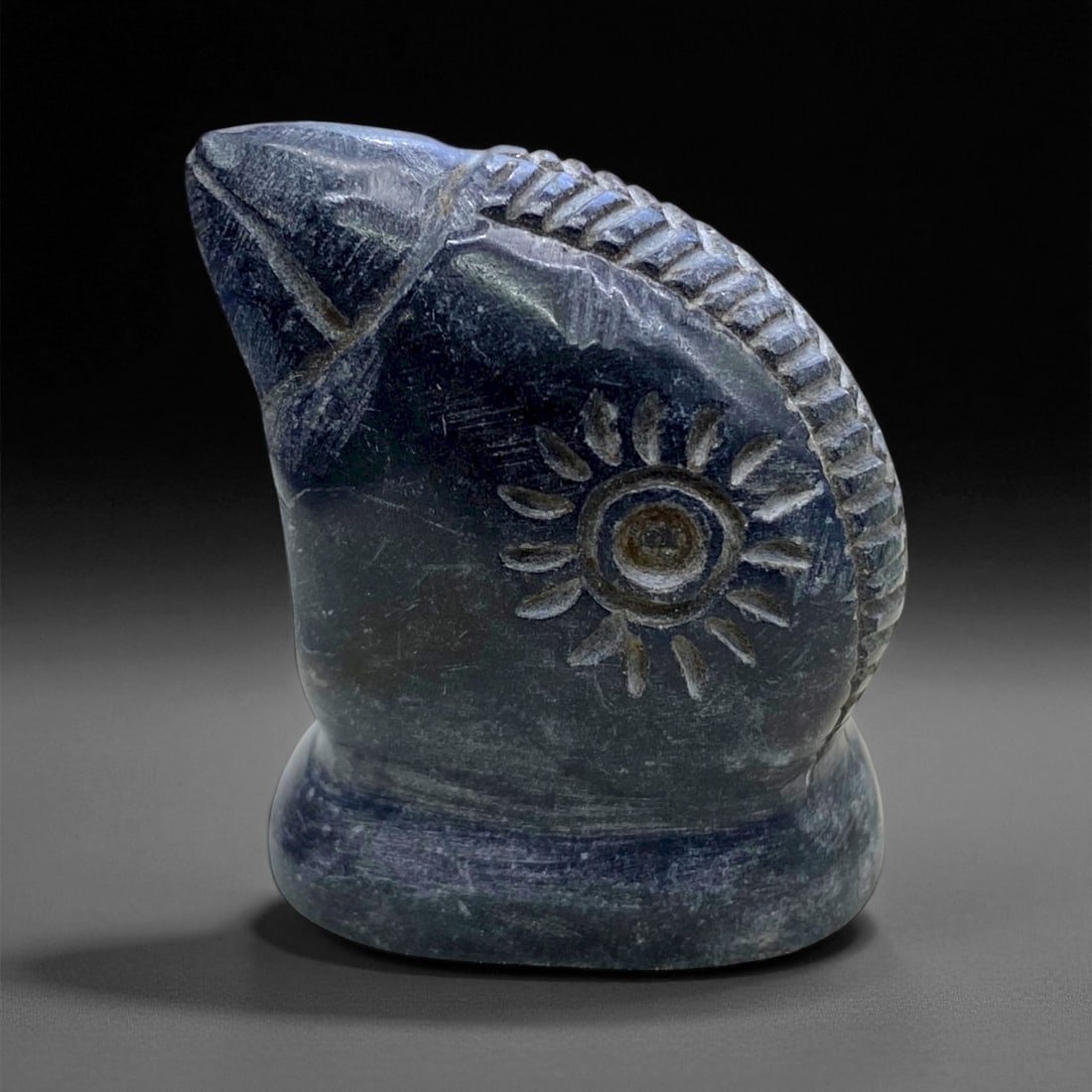 Ancient Medieval Islamic Steatite Bird-Head Weight, c. 12th-14th Century, 4.5cm, 70g, 99DD: This finely carved steatite weight, shaped in the form of a stylized bird's head, dates to the Islamic Medieval period between the 12th and 14th centuries. Weights of this kind were used across the Is
