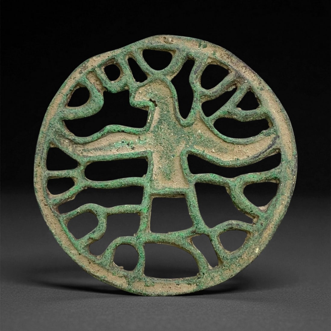 A Neo-Assyrian Bronze Openwork Stamp Seal with Vulture Motif, c. 9th-7th Century BCE, 7cm, 56g, 91CC: This remarkable openwork bronze stamp seal originates from the Neo-Assyrian period, dating to approximately the 9th-7th century BCE. Crafted in the A cities of northern Mesopotamia, such seals reflect