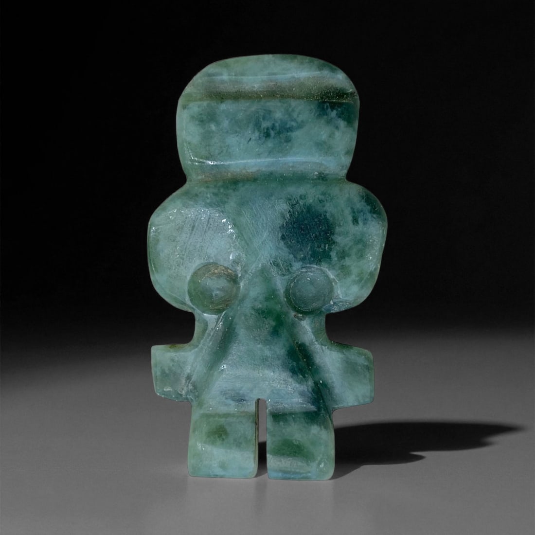 Pre-Columbian Mesoamerican Jade Anthropomorphic Figurine, c. 900-1500 CE, 4.5cm, 17g, 16AA: This captivating Pre-Columbian jade figurine, dating from approximately 900-1500 CE, embodies the refined artistic and spiritual traditions of Mesoamerican cultures during the Late Classic to Post-Cla