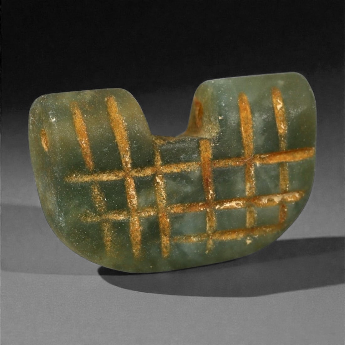 Ancient Achaemenid Persian Green Serpentine Plaque Amulet, c. 6th-4th Century BCE (2 cm), 30A: This finely carved amulet, shaped from deep green serpentine stone, originates from the Achaemenid Persian Empire, a civilization renowned for its refined lapidary traditions and symbolic use of natur