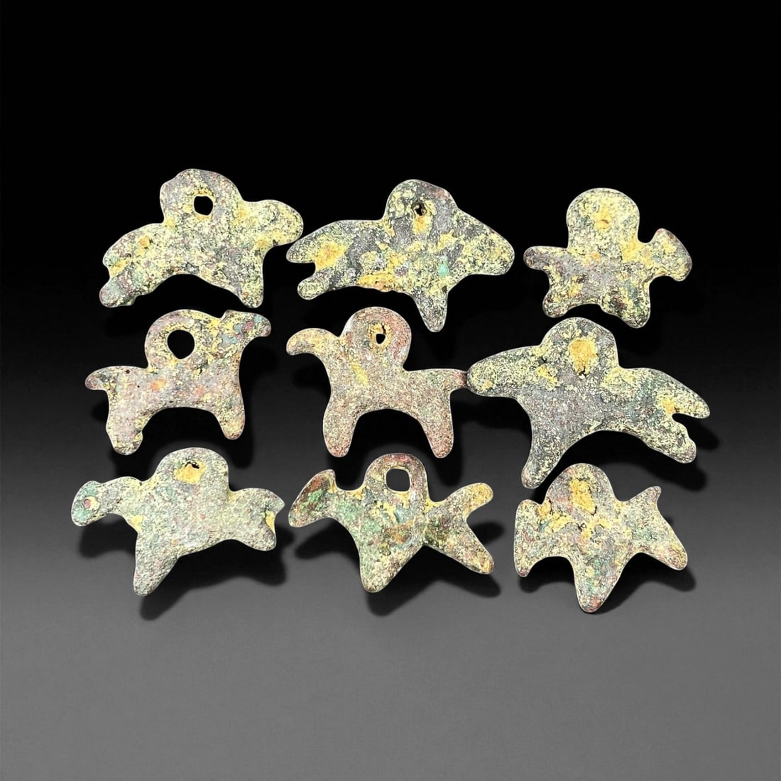 Ancient Luristan Bronze Zoomorphic Amulets, c. 10th-8th Century BCE, 1.7-2.4 cm, 49EN: These small yet evocative bronze amulets originate from ancient Luristan, located in the mountainous region of western Iran, and date to the early Iron Age between the 10th and 8th centuries BCE. Each