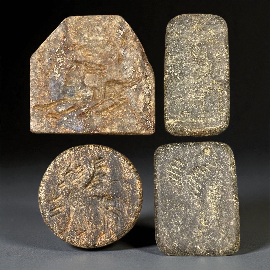 Ancient Neo-Sumerian Steatite Stamp Seal Group, c. 21st-20th Century BCE, 2.6-3cm, 85EP: This impressive group of carved steatite stamp seals dates to the Neo-Sumerian period, a flourishing era of artistic refinement and administrative precision in ancient Mesopotamia. Each seal features 