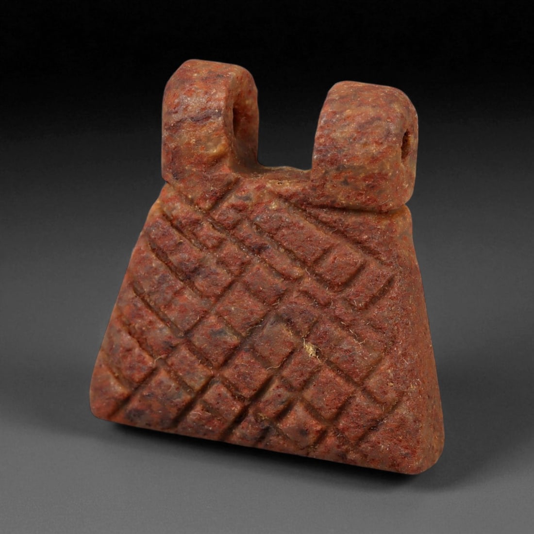 Ancient Sasanian Persian Red Jasper Geometric Pendant Amulet, c. 3rd-6th Century CE (2.5 cm), 44WD: This rare geometric pendant, carved from rich red jasper, dates to the Sasanian Persian Empire-a period celebrated for its synthesis of artistry, symbolism, and refined lapidary technique. The amulet'