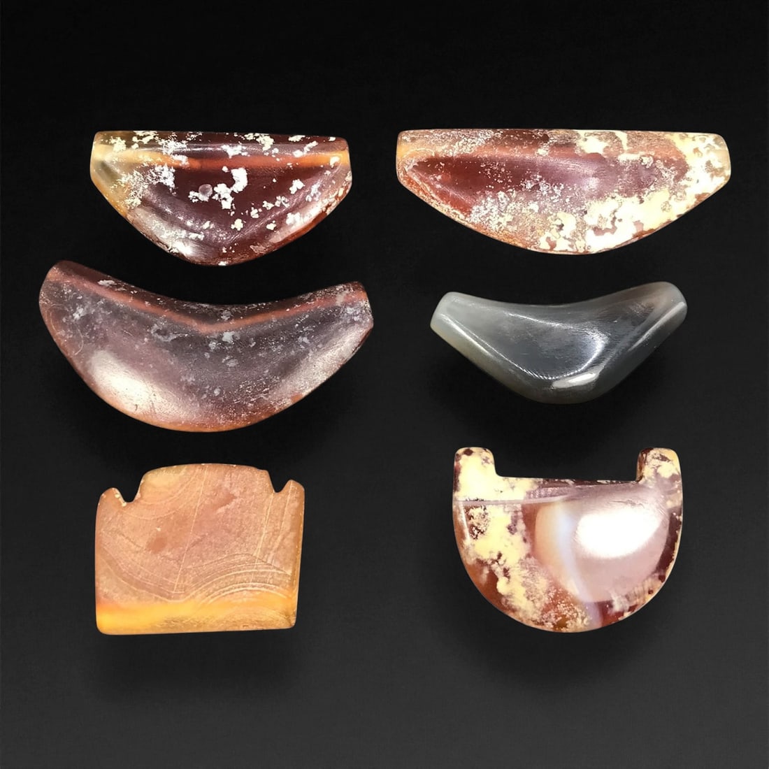 Ancient Persian Carnelian Bow Amulet Beads c. 1st Mill BCE 2.6-4.6cm, 62ER: These ancient Persian bow amulets reflect a revered talismanic tradition, shaped during the 1st millennium BCE when carnelian and agate were carefully worked into protective forms. Their distinct cres