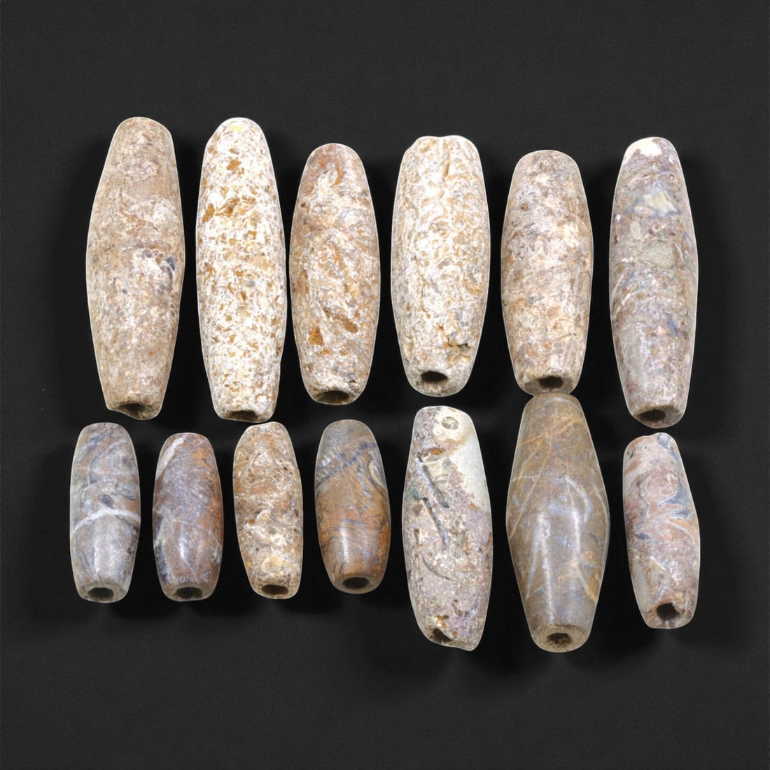 Ancient Indus Valley Steatite Barrel Beads, c. 2600-1900 BCE, 2.2-4cm, 82EL: These ancient barrel-shaped beads originate from the Indus Valley Civilization, one of the earliest and most sophisticated urban cultures of the Bronze Age. Dated to around 2600-1900 BCE, they were ca