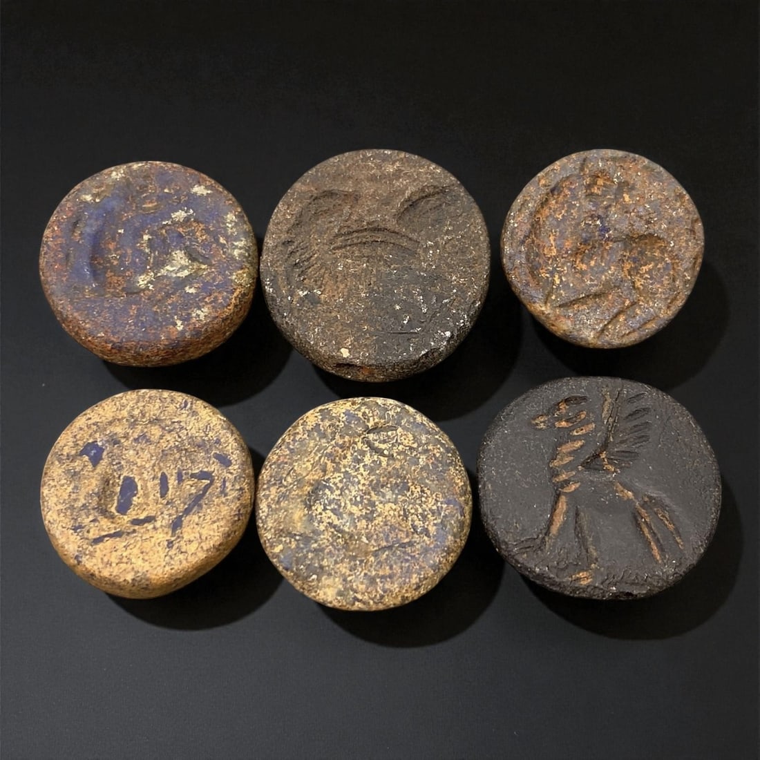 Ancient Neo-Sumerian Lapis and Steatite Round Stamp Seals, c. 21st-20th Century BCE, 1.7-2 cm, 66EK: This group of six finely carved round stamp seals dates to the Neo-Sumerian period, a time of renewed artistic refinement and centralized governance following the Akkadian Empire's decline. Fashioned 