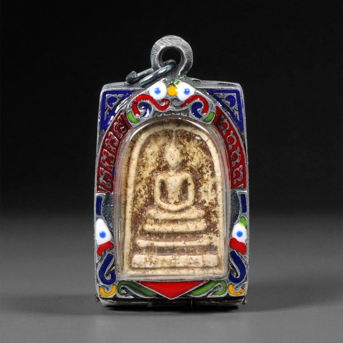 Vintage Thai Buddhist Amulet in Ornate Framed Setting, 20th Century , 5.5cm, 31WF: This vintage Thai Buddhist amulet exemplifies the devotional artistry that continues to define Thailand's sacred craftsmanship. Encased within an intricately detailed frame, the amulet displays refine