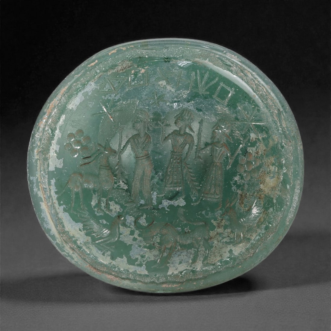 A Sasanian Green Glass Plaque with Ritual Procession and Animals, 3rd-7th Century CE, 31LP (1 of 2)