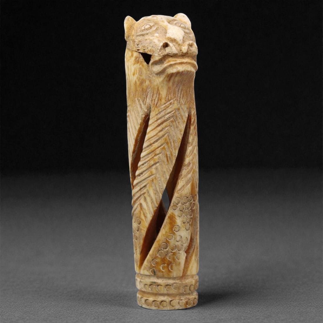 Ancient Coptic Egyptian Feline Finial, Bone, c. 6th-8th Century CE, 8.4cm, 52BC: This intricately carved Coptic Egyptian finial, dates to approximately the 6th-8th century CE, during the early Christian period of Egypt when Coptic artisans merged ancient Egyptian symbolism with ne