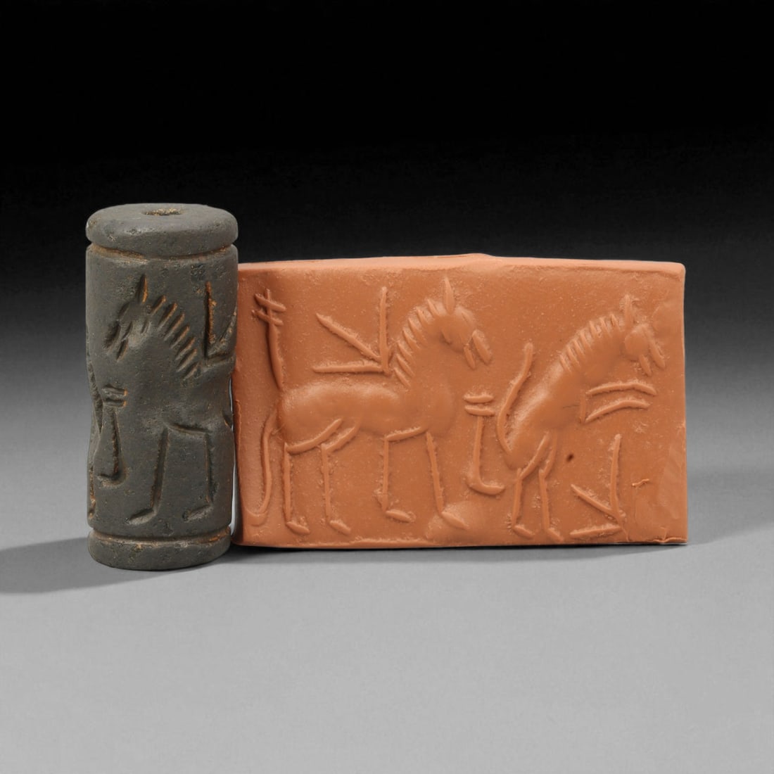 Ancient Mesopotamian Ritual and Administrative Cylinder Seal, c. 2000-1000 BCE, 4.3cm, 90K: A striking relic from the dawn of civilization, this ancient Mesopotamian cylinder seal dates to the 2nd-1st millennium BCE - a period when art, writing, and ritual became inseparable expressions of c