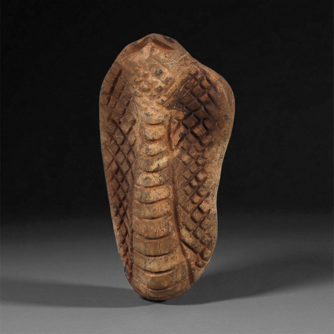 An Egyptian Stone Cobra Figure, Predynastic Period, 4th Millennium BCE, 1ZA (1 of 2)
