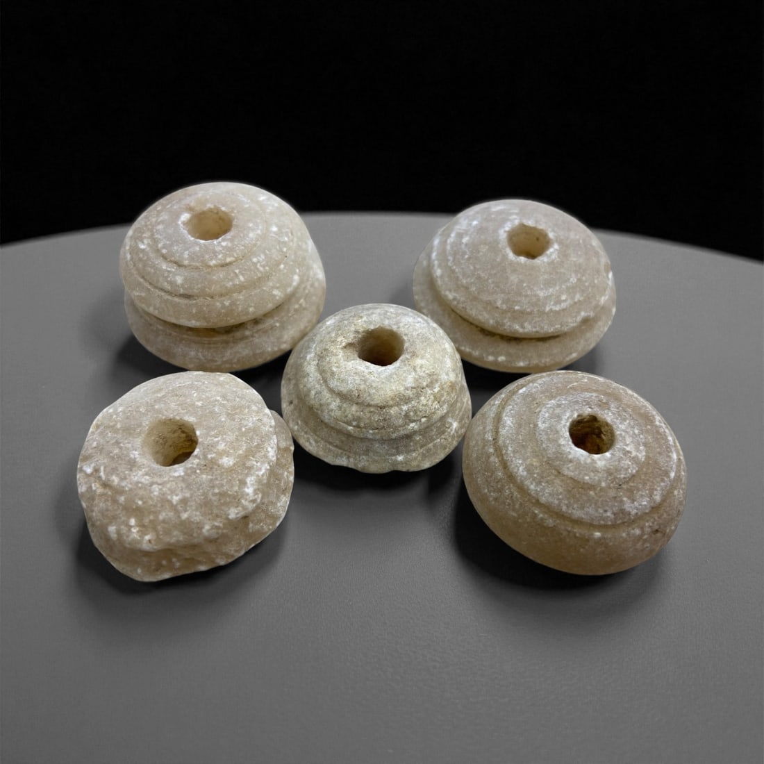 A Group of Five Calcite Spindle Whorls, Near East, 1st Millennium BCE, 55 g, 41EE (1 of 1)