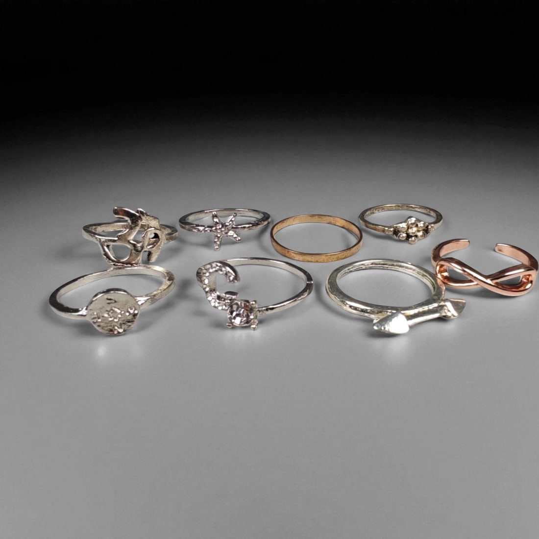 Lot of 8 Vintage and Contemporary Fashion Ring Lot, c. 20th-21st Century, 60WA: This assorted lot of vintage and contemporary fashion rings offers a vibrant collection of statement pieces showcasing diverse styles, materials, and craftsmanship. Designed for decorative wear rather