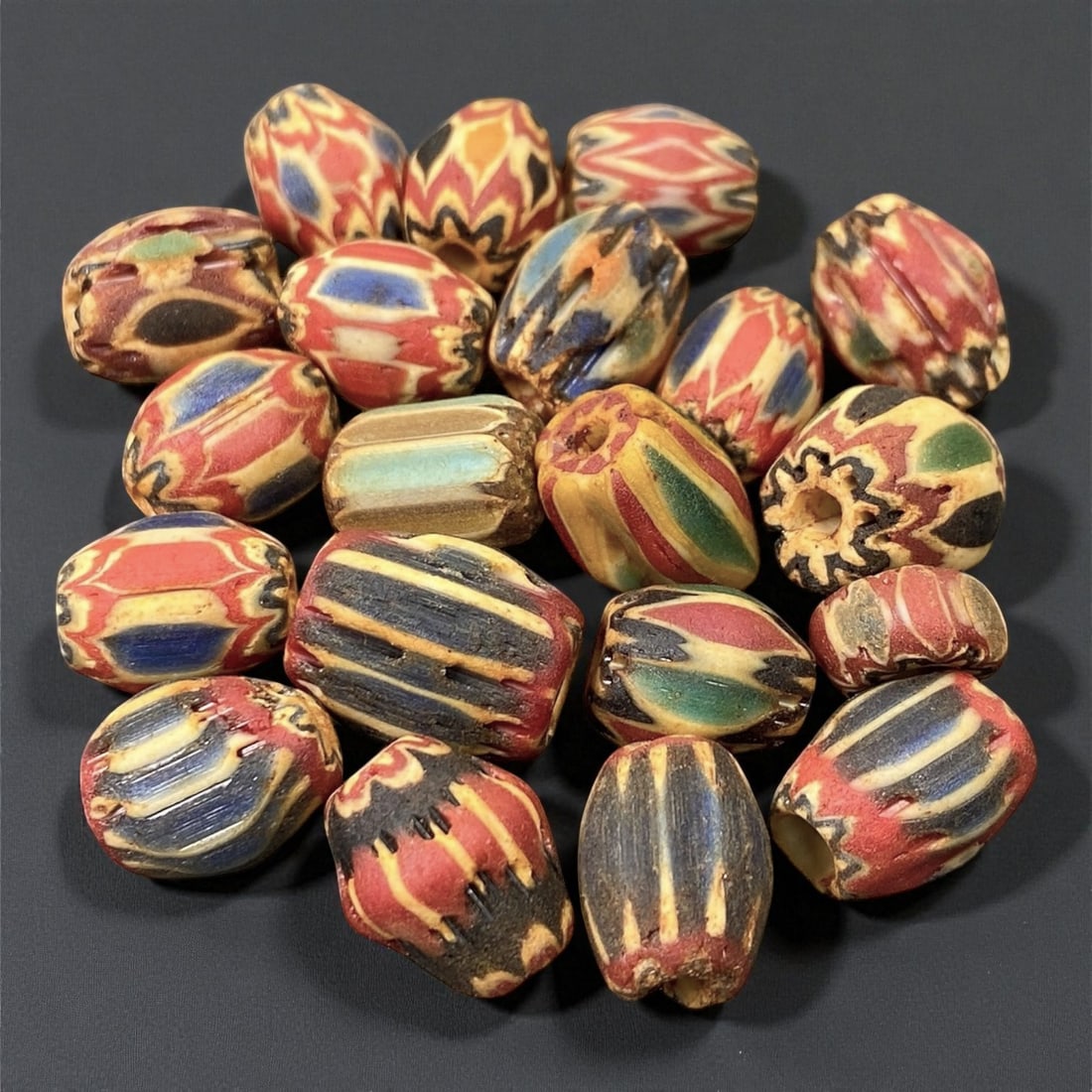 Antique Venetian Chevron Trade Beads, c. 19th Century, 1.1-1.4cm, 57EK: This vibrant lot of antique Venetian chevron beads, dating to the 19th century, represents one of the most recognizable and sought-after forms of European glass artistry. Produced in Venice and Murano