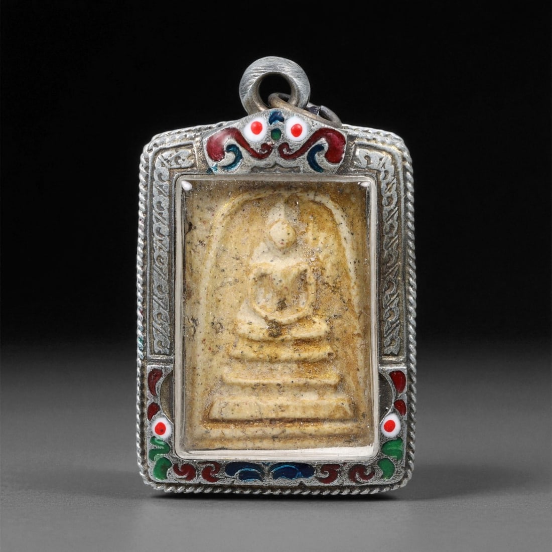 Vintage Thai Buddhist Amulet in Ornate Framed Setting, 20th Century , 6cm, 74WF: This vintage Thai Buddhist amulet exemplifies the devotional artistry that continues to define Thailand's sacred craftsmanship. Encased within an intricately detailed frame, the amulet displays refine