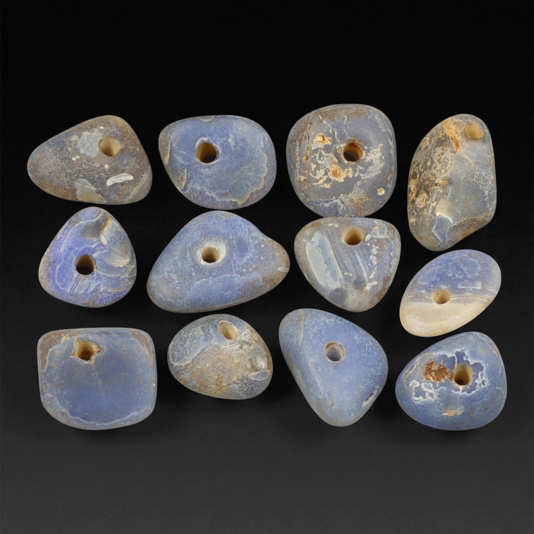 Ancient Mediterranean Chalcedony Trade Beads, c. 6th-4th Century BCE, 1.5-2cm, 58EB: These ancient chalcedony beads, dating to the 6th-4th century BCE, originate from the Mediterranean trade networks that connected the Aegean, Levant, and North African coasts during the height of clas