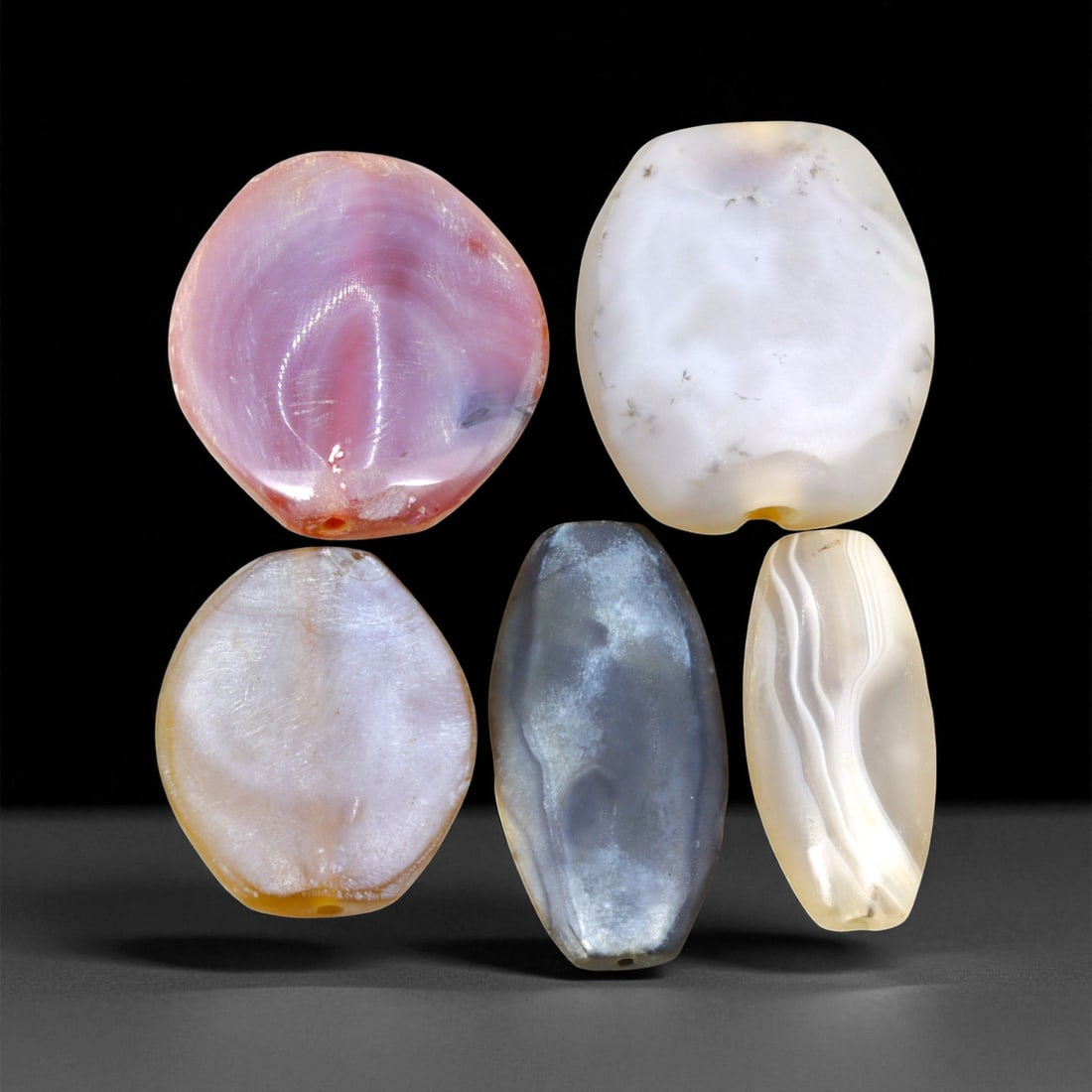 Ancient Achaemenid Persian Agate Polygonal Beads, c. 6th-4th Century BCE, 3.3-3.7cm, 33EL: This elegant assemblage of five agate beads originates from the Achaemenid Persian Empire, a period spanning the 6th to 4th century BCE, renowned for its refined artistry and far-reaching cultural exc