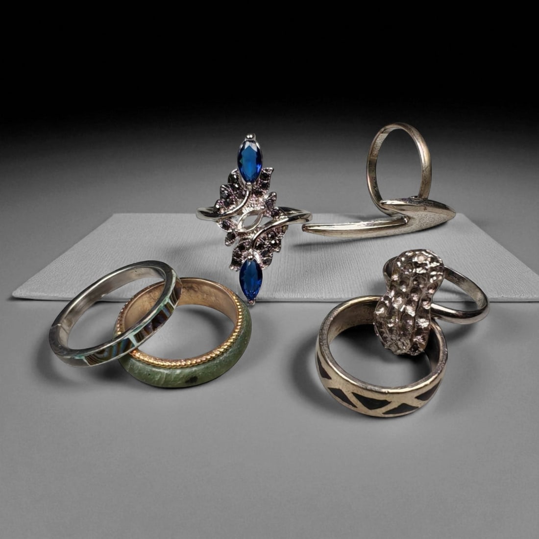 Lot of 6 Vintage and Contemporary Fashion Ring Lot, c. 20th-21st Century, 35WB: This assorted lot of vintage and contemporary fashion rings offers a vibrant collection of statement pieces showcasing diverse styles, materials, and craftsmanship. Designed for decorative wear rather