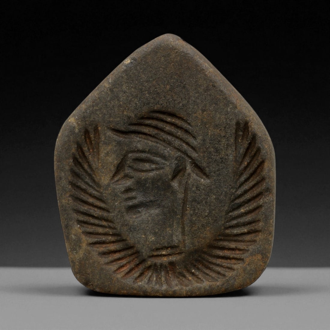 Ancient Parthian Stone Amulet with Winged Head Motif, c. 1st Century BCE-1st Century CE, 6.5cm, 12DQ (1 of 2)