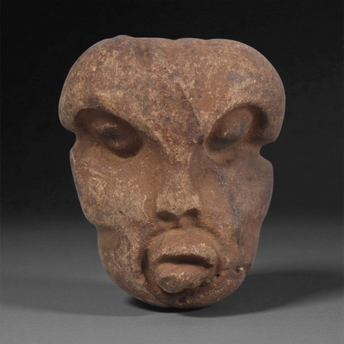 A Mediterranean Stone Maskette, 12th-17th Century, 80ZA (1 of 2)