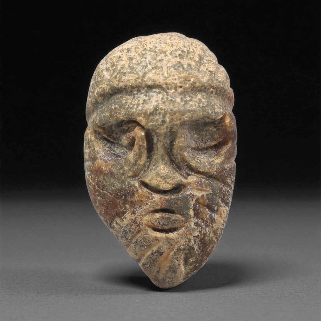 A Mediterranean Stone Maskette, 12th-17th Century, 17LC (1 of 2)