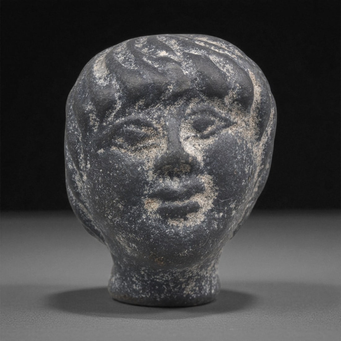 A Near Eastern Stone Bust, 1st Millennium BCE, 34LF (1 of 2)