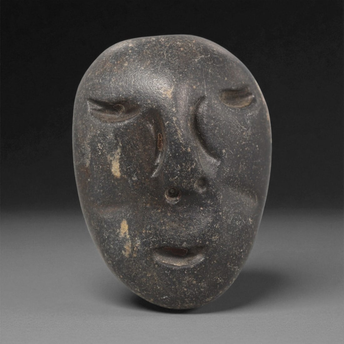 A Mediterranean Stone Maskette, 12th-17th Century, 11LC (1 of 2)