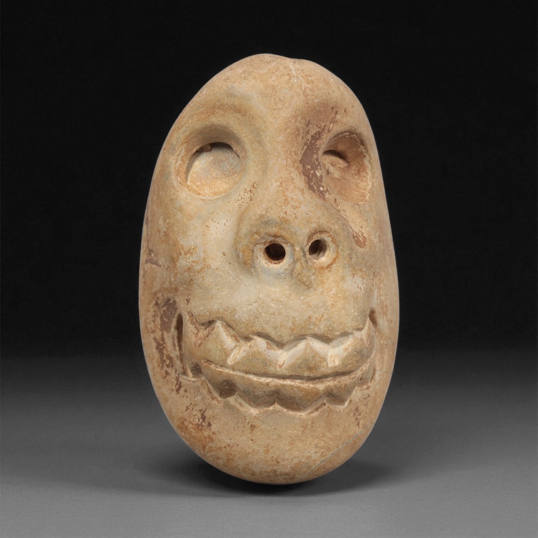 A Mediterranean Stone Maskette, 12th-17th Century, 81LC (1 of 2)