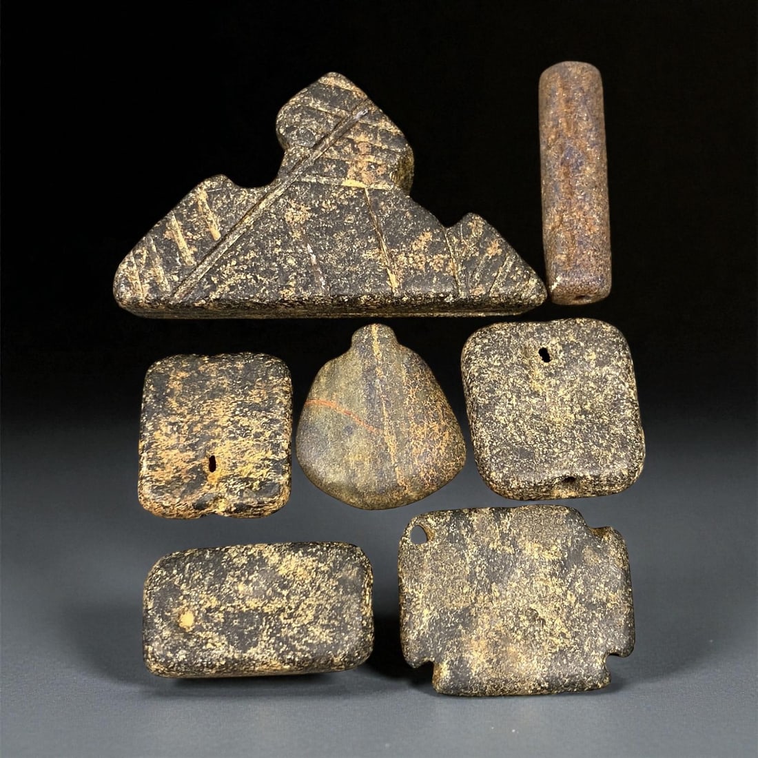 Ancient Indus Valley Steatite Amulets and Beads, c. 3rd Millennium BCE, 1.7-4.6 cm, 49EP: This remarkable collection of steatite amulets and beads originates from the Indus Valley Civilization (c. 2600-1900 BCE), one of the earliest centers of urban culture and artistic innovation. Each pi