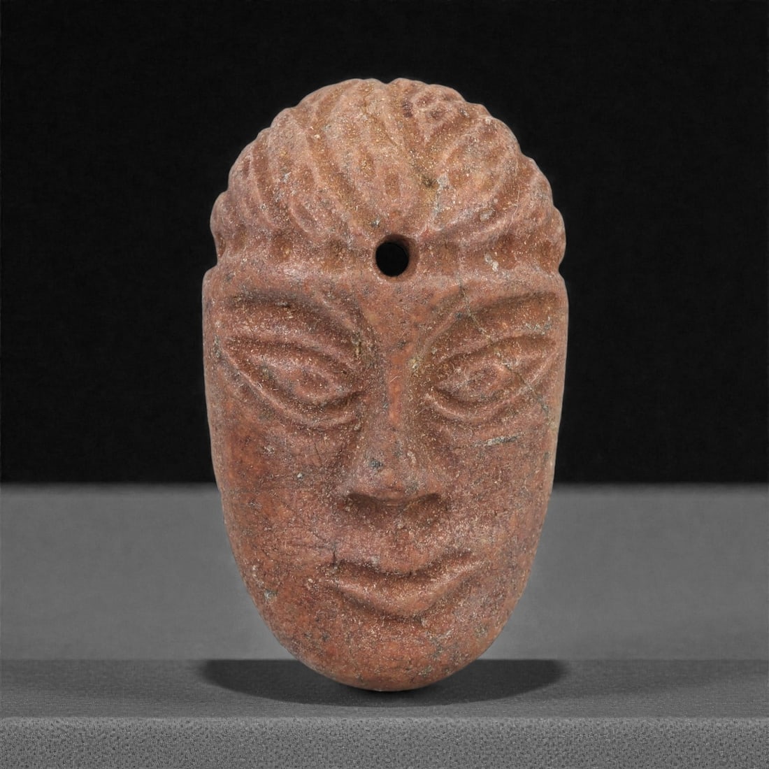 A Phoenician Stone Head Amulet, Iron Age II-III, 9th-6th Century BCE, 75LN (1 of 2)
