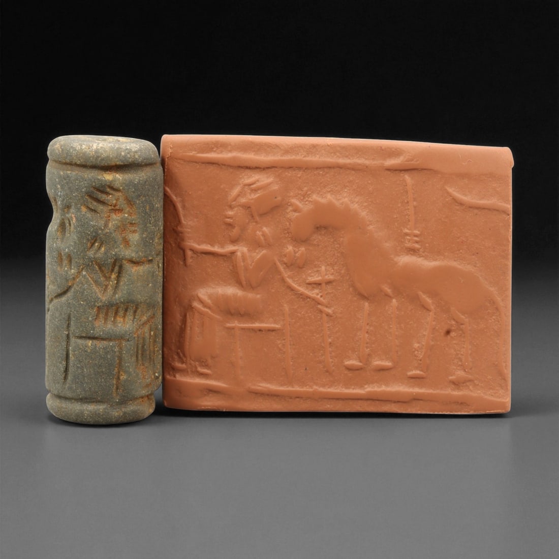 A Mesopotamian Stone Cylinder Seal, 3rd-2nd Millennium BCE, 4.1cm, 51EJ: This Mesopotamian cylinder seal dates to the 2nd-1st millennium BCE. Carved from stone, it would have been used to roll designs onto wet clay as a mark of ownership or identification. The seal fits co