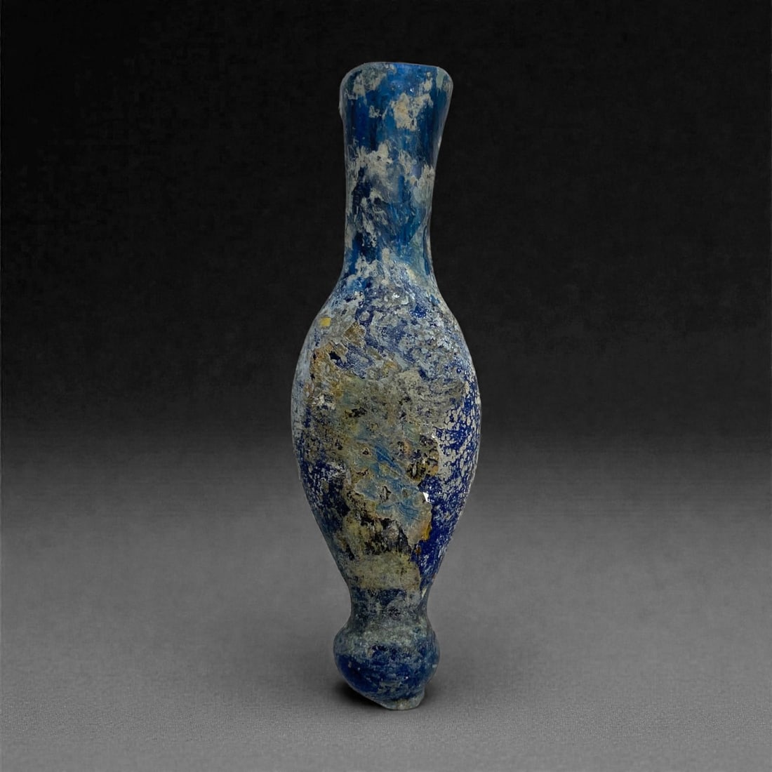 An Eastern Mediterranean Core-Formed Glass Alabastron, Hellenistic Period, 3rd-1st C. BCE, 7g, 46AA (1 of 2)