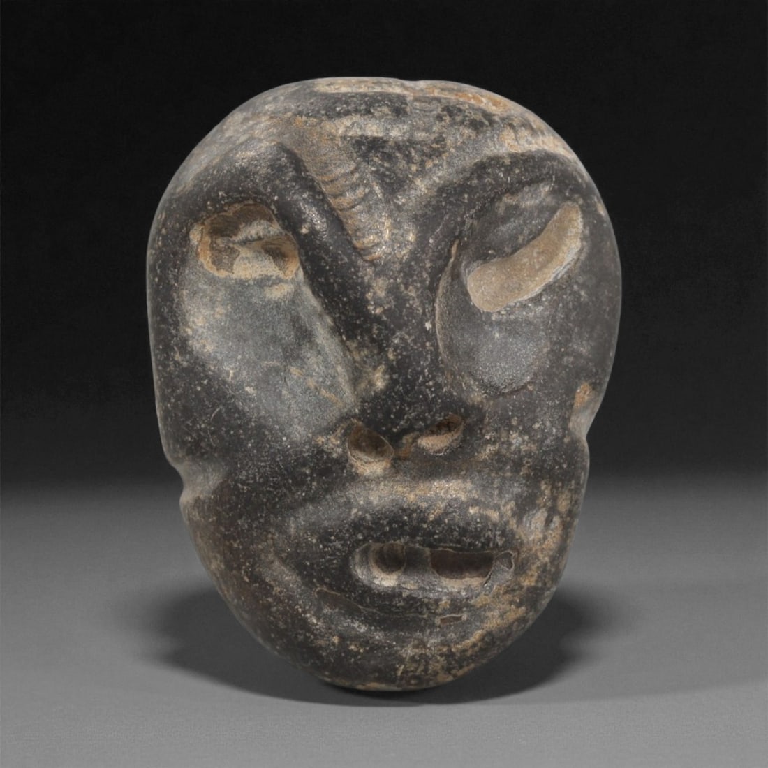 A Mediterranean Stone Maskette, 12th-17th Century, 7LC (1 of 2)