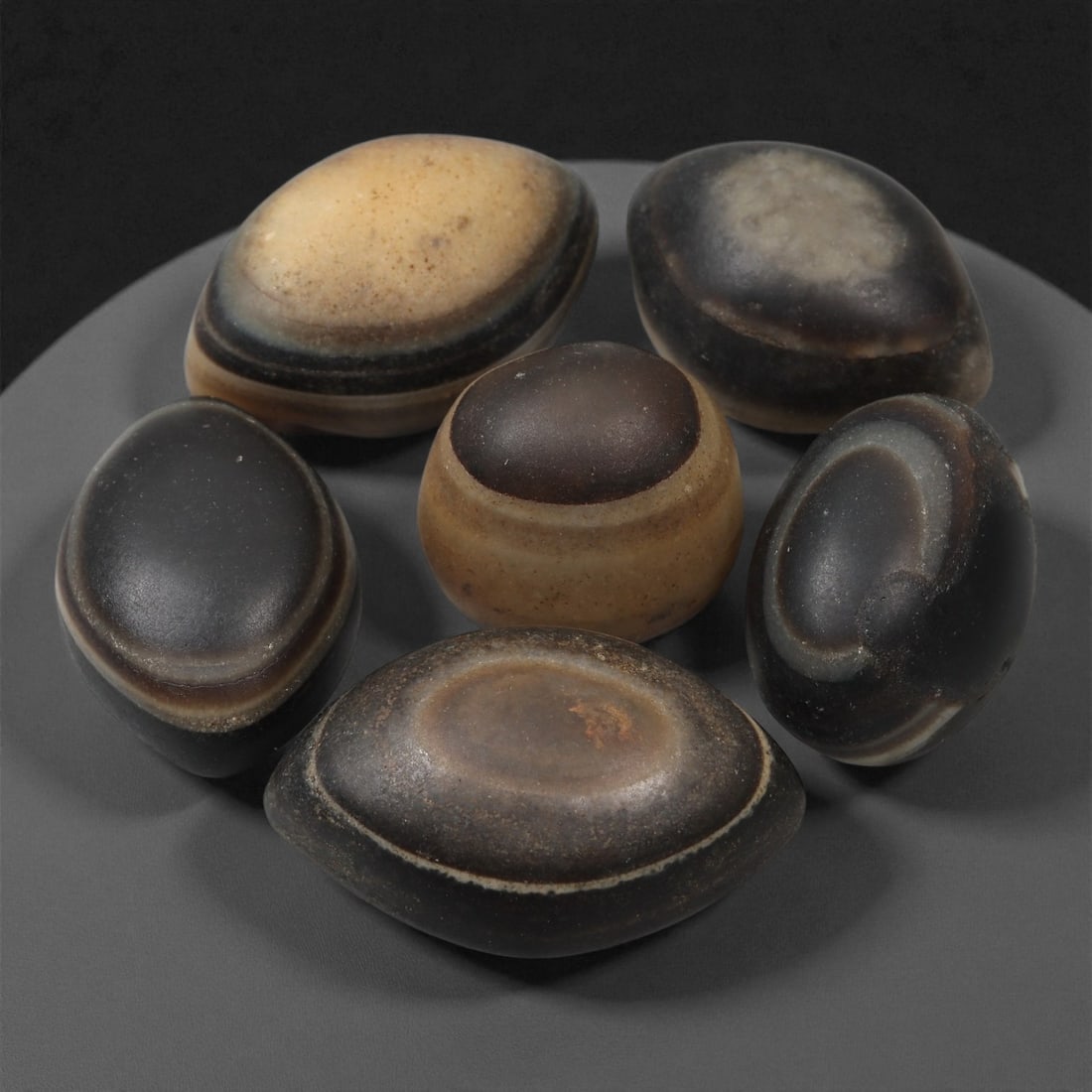 A Group of Tibetan Stone Luk Mik ("Goat Eye") Beads, 19th-Early 20th Century, 10LG (1 of 1)