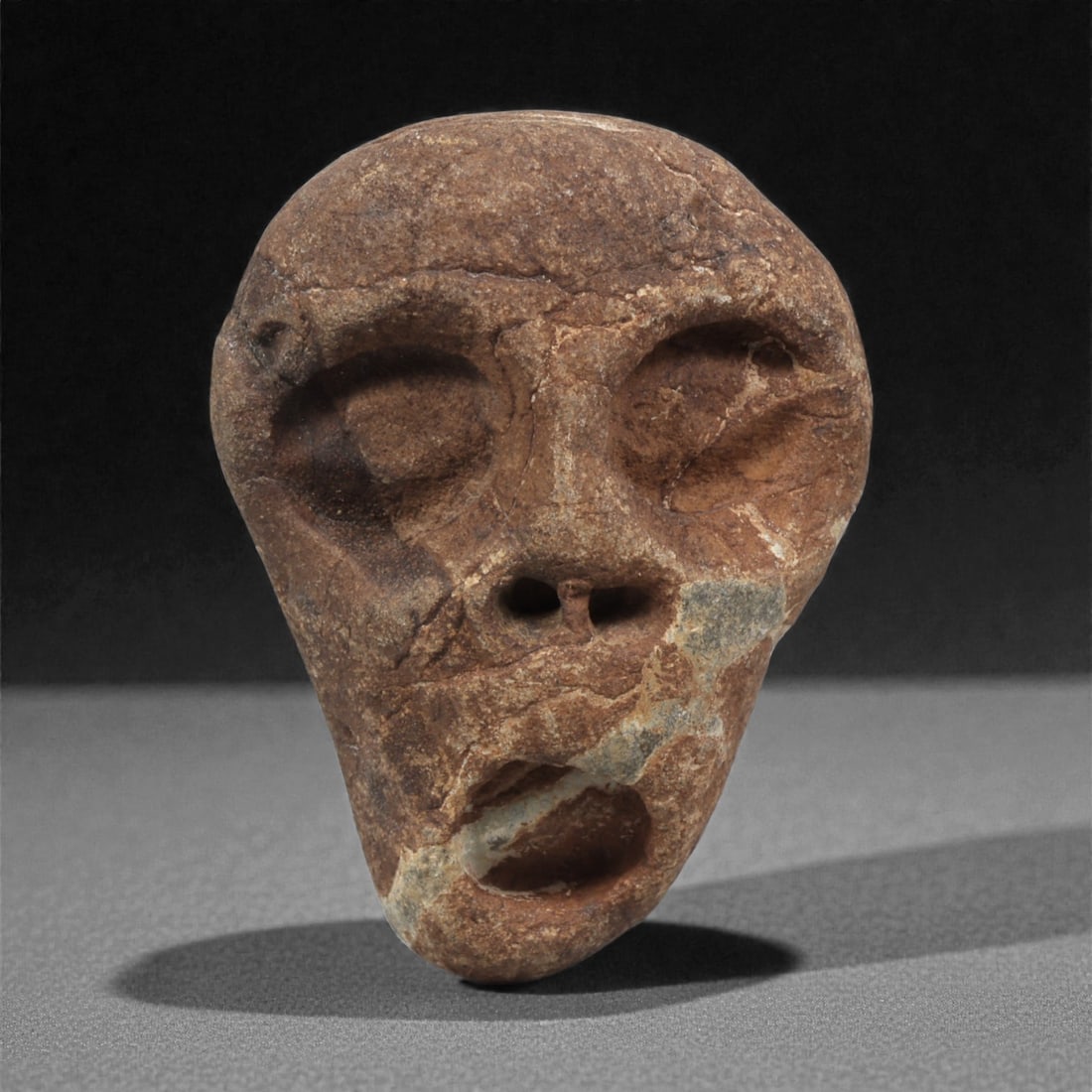 A Mediterranean Stone Maskette, 12th-17th Century, 32AC (1 of 2)