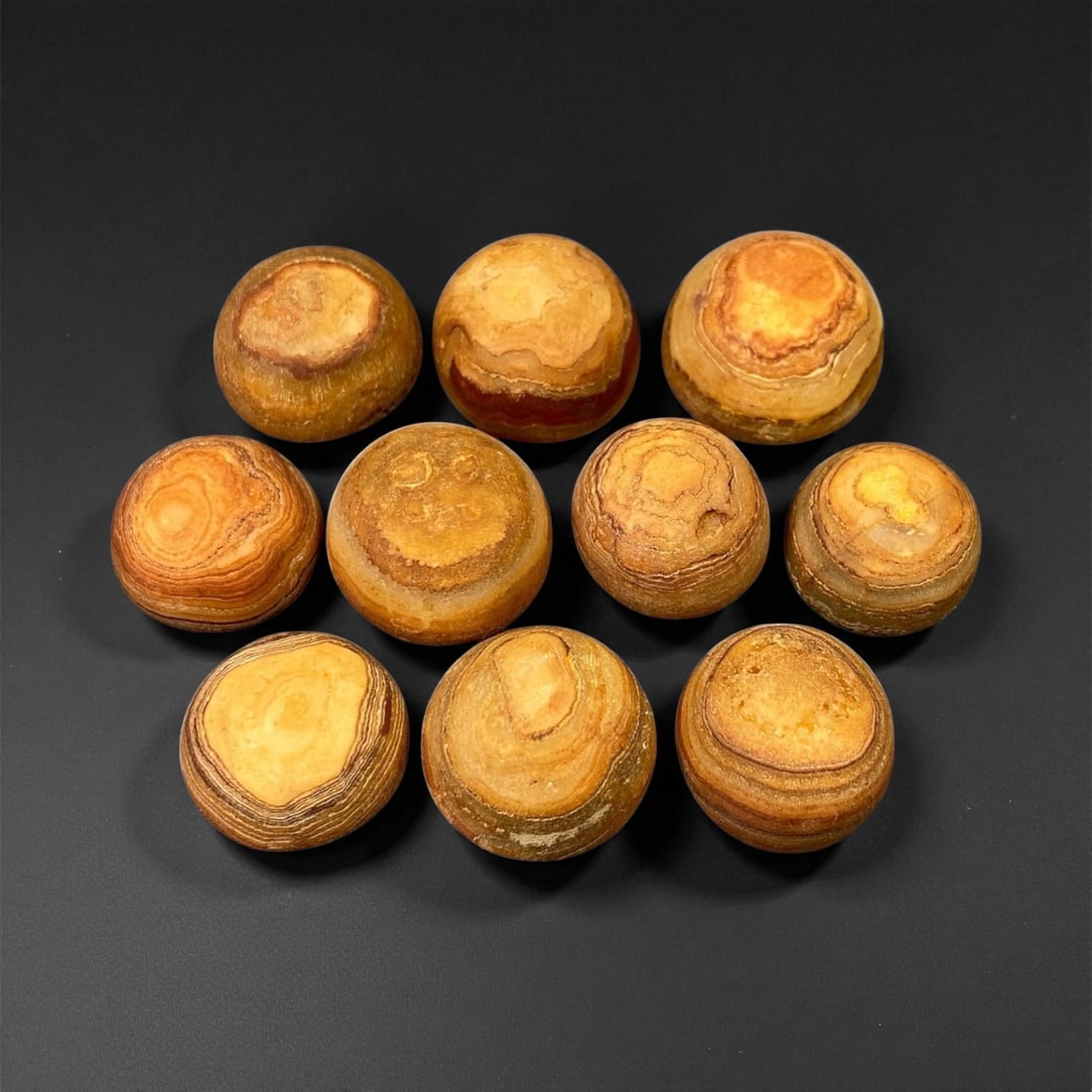 Antique Tibetan Luk Mik Agate Beads, c. 19th-20th Century, 1.6-2cm, 65C: These antique Tibetan Luk Mik agate beads, dating from the 19th to early 20th century, are a revered form of Himalayan spiritual ornamentation known for their distinctive concentric banding and natura