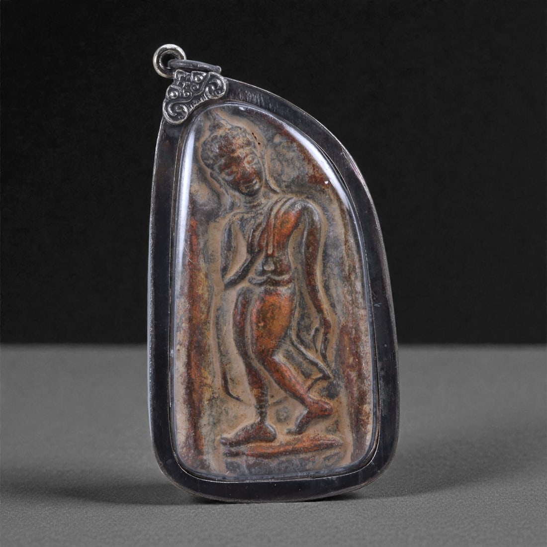 Buddhist Amulet Pendant - Southeast Asian Walking Buddha Plaque, 55L: This amulet features a slender relief of a walking Buddha, the figure shown with one leg gracefully extended and the opposite arm raised in a gentle gesture, emphasizing fluidity and compassion within