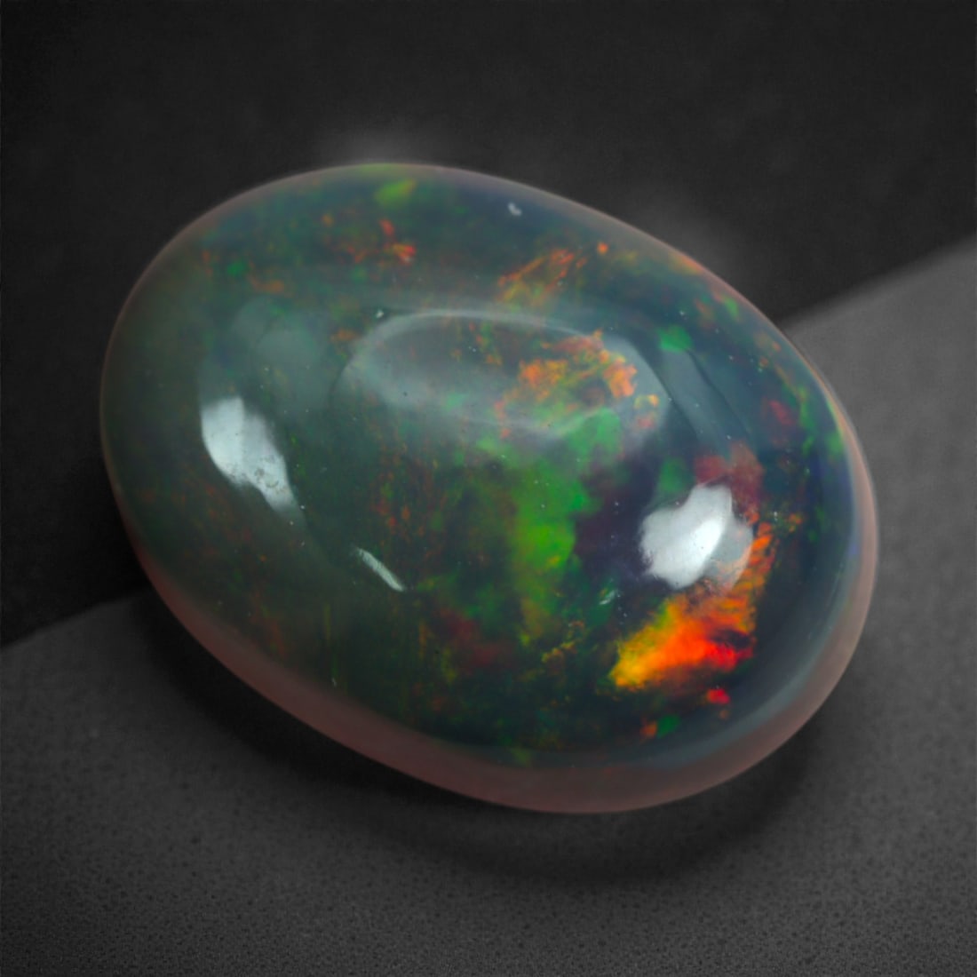 2.90 Carats Fireburst Red and Jungle Green Oval Black Opal - Natural Welo Origin, 22M (1 of 3)