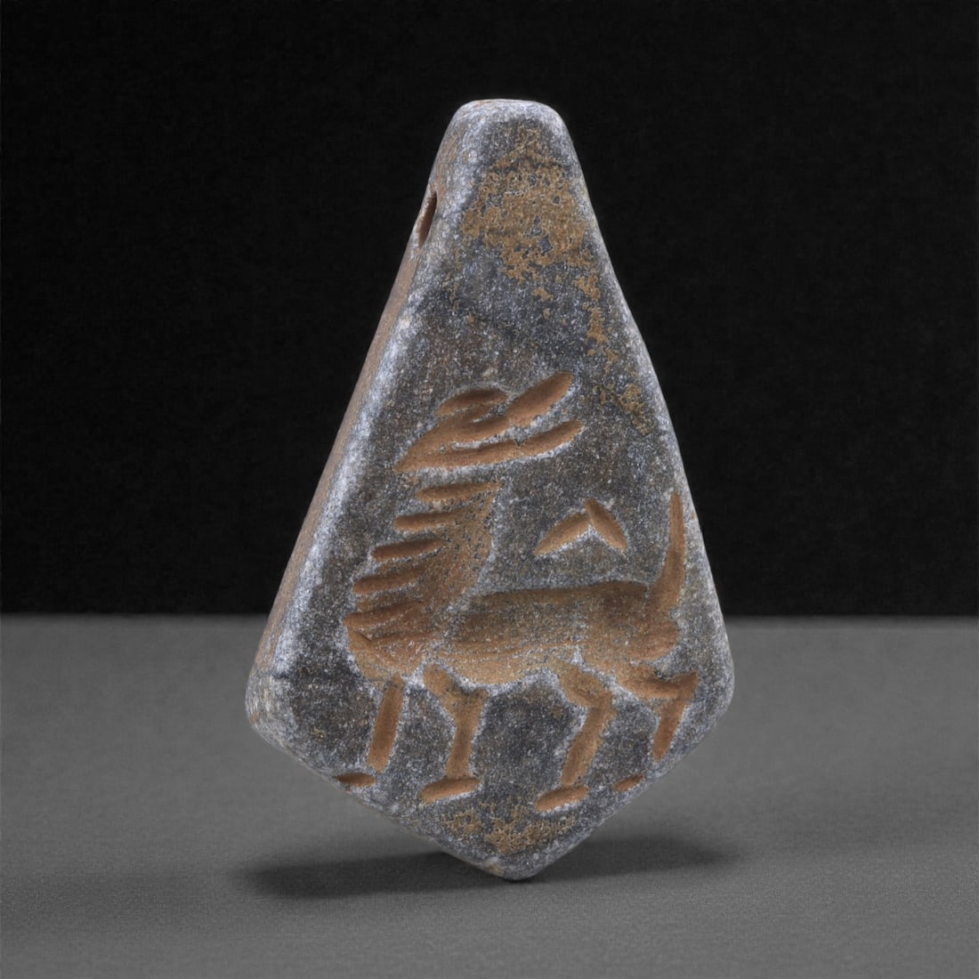 A Near Eastern Stone Double-Sided Amulet, 3rd Millennium BCE, 72K (1 of 2)