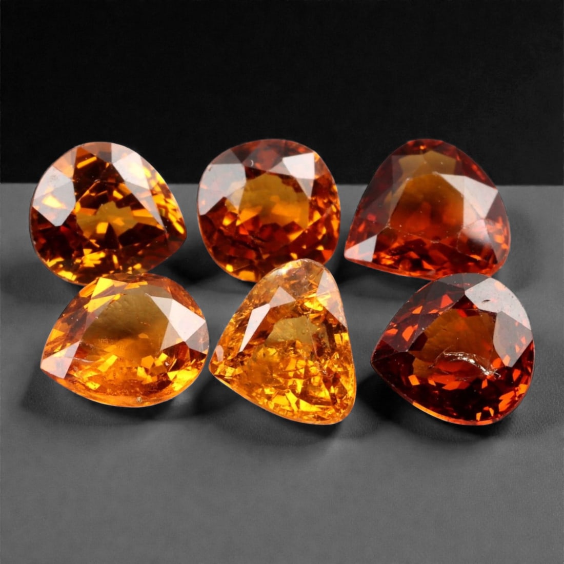 5.21 Carats Golden-Orange Faceted Songea Sapphire Parcel - Natural Tanzanian Stones, 56XA: This vibrant parcel of Songea sapphires glows with a fiery palette ranging from deep amber and burnt orange to bright golden honey tones. Each gem, averaging 6.1 x 6.1 x 2.8 mm, is expertly faceted to