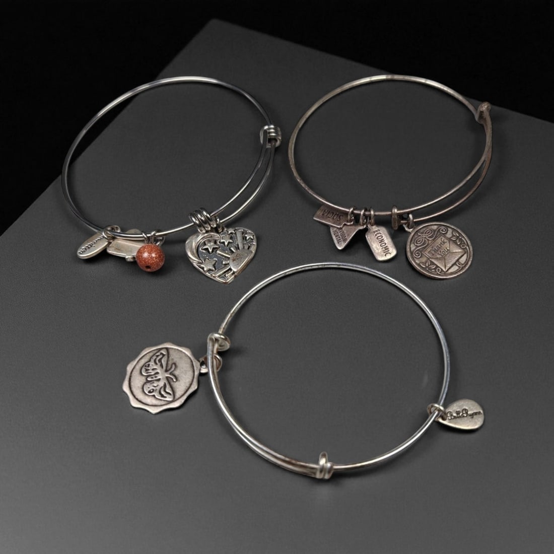 Set of Three Silver-Tone Charm Bangles - Heart, Coin, and Symbolic Motifs, 12WB (1 of 1)