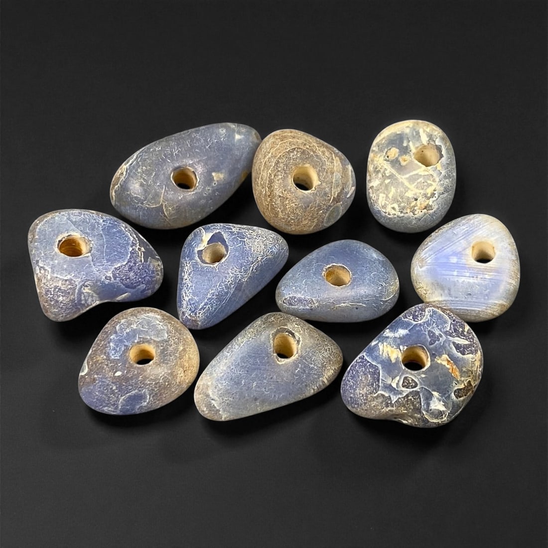 Ancient Mediterranean Chalcedony Trade Beads, c. 6th-4th Century BCE, 1.2-1.5cm, 55C: These ancient chalcedony beads, dating to the 6th-4th century BCE, originate from the Mediterranean trade networks that connected the Aegean, Levant, and North African coasts during the height of clas