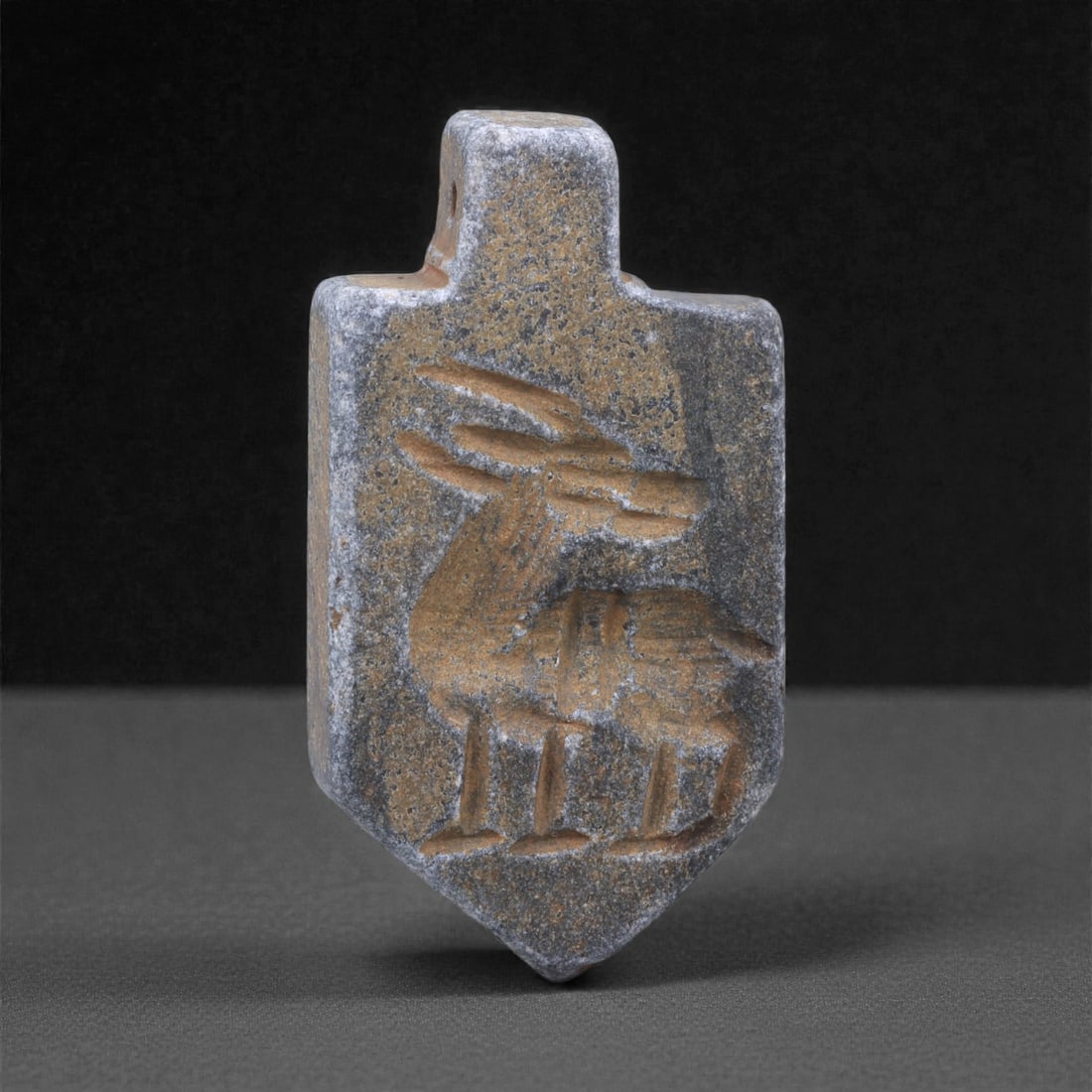 A Near Eastern Stone Double-Convex Amulet, 3rd Millennium BCE, 48K (1 of 2)