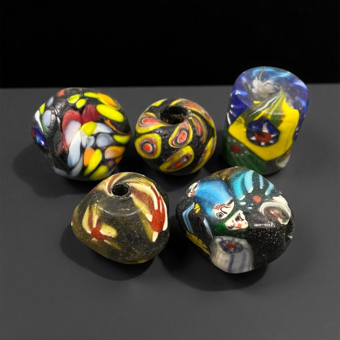 Vintage Mid-Century Venetian Millefiori and Mosaic Glass Beads, c. 1950s, 1.5-2cm, 53EP: These colorful vintage glass beads were crafted in Venice during the mid-20th century, continuing the celebrated Murano tradition of millefiori and mosaic glassmaking. Each bead is a miniature work of