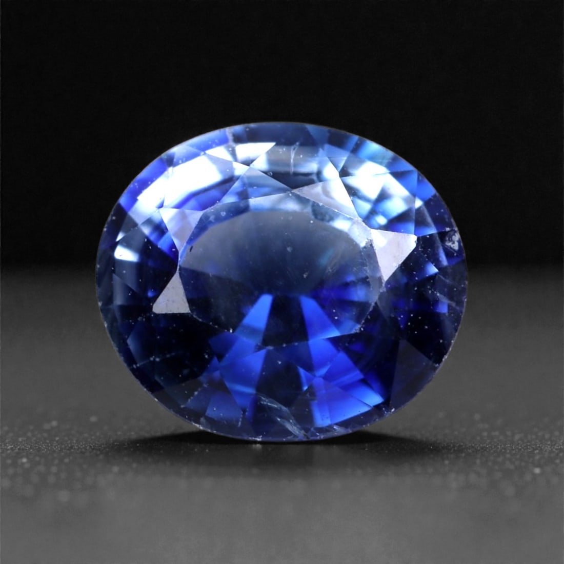 0.86 Carats Deep Royal Blue Sapphire - Natural Ceylon Gem 5x5x3mm, 10XC: This captivating sapphire glows with a deep royal blue tone, displaying excellent saturation and a velvety richness across its compact 5x5x3 mm form. Weighing 0.86 carats, the gem is precision-cut wit