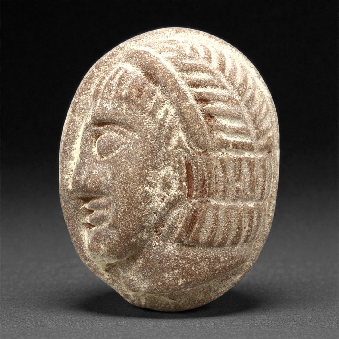 A Mesopotamian Sandstone Carved Human Head Plaque, Early Dynastic Period, Circa 2900-2350 BCE, 90ET (1 of 2)