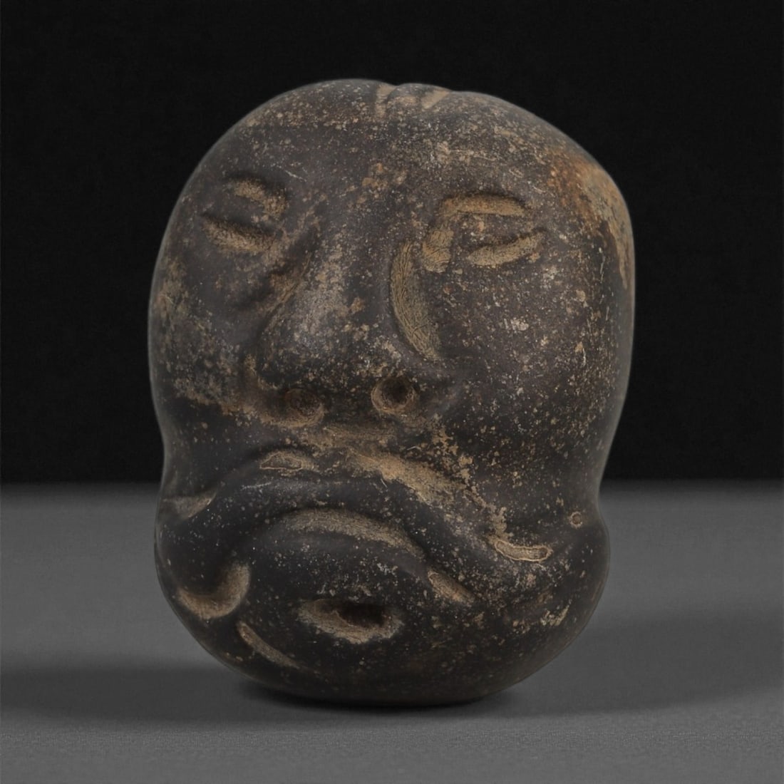 A Mediterranean Stone Maskette, 12th-17th Century, 24ZA (1 of 2)