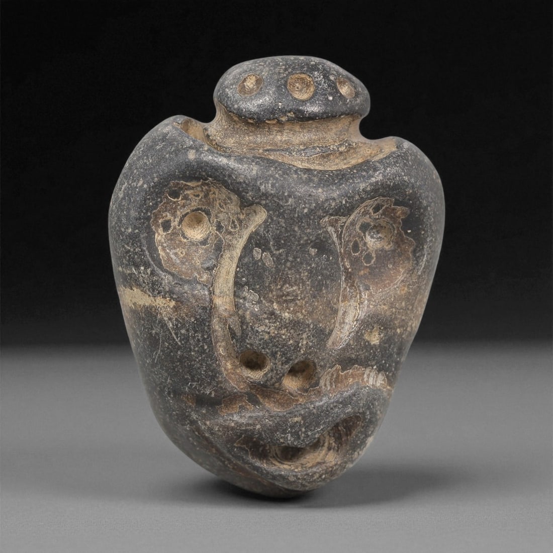 A Mediterranean Stone Maskette, 12th-17th Century, 8LC (1 of 2)