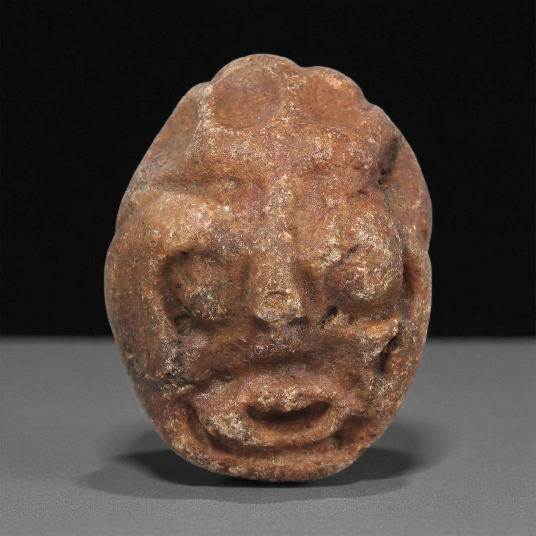 A Mediterranean Stone Maskette, 12th-17th Century, 21LC (1 of 2)