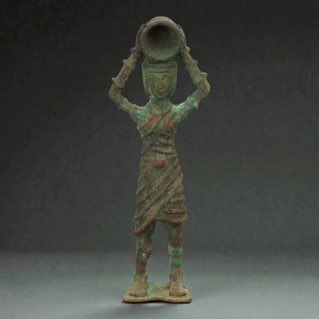 An Indian Bronze Figure of a Water-Bearer, Early Medieval Period, 9th-11th Century CE, 74LP (1 of 3)